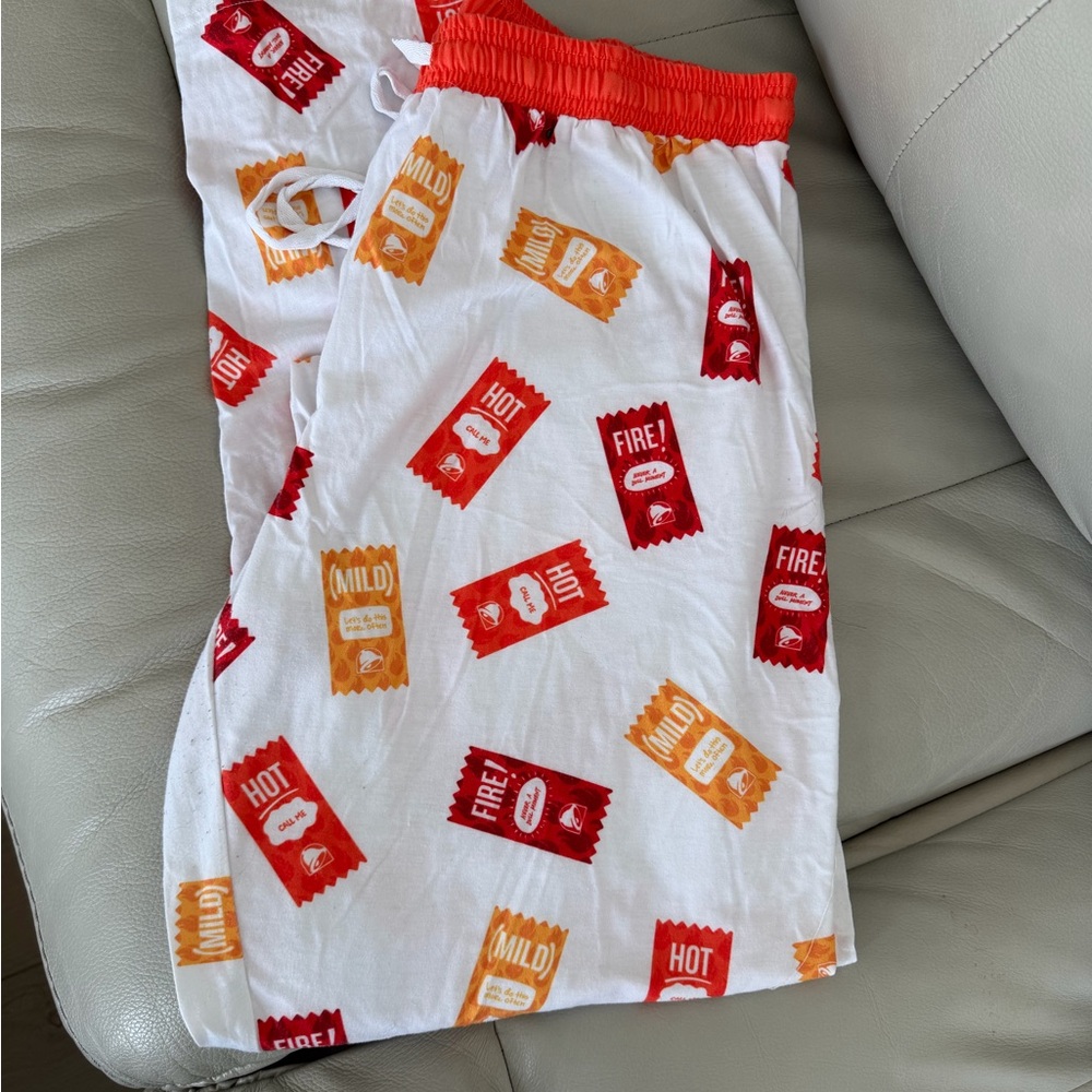 Taco Bell White Lounge Pants with Red & Orange Sauce Packet Print